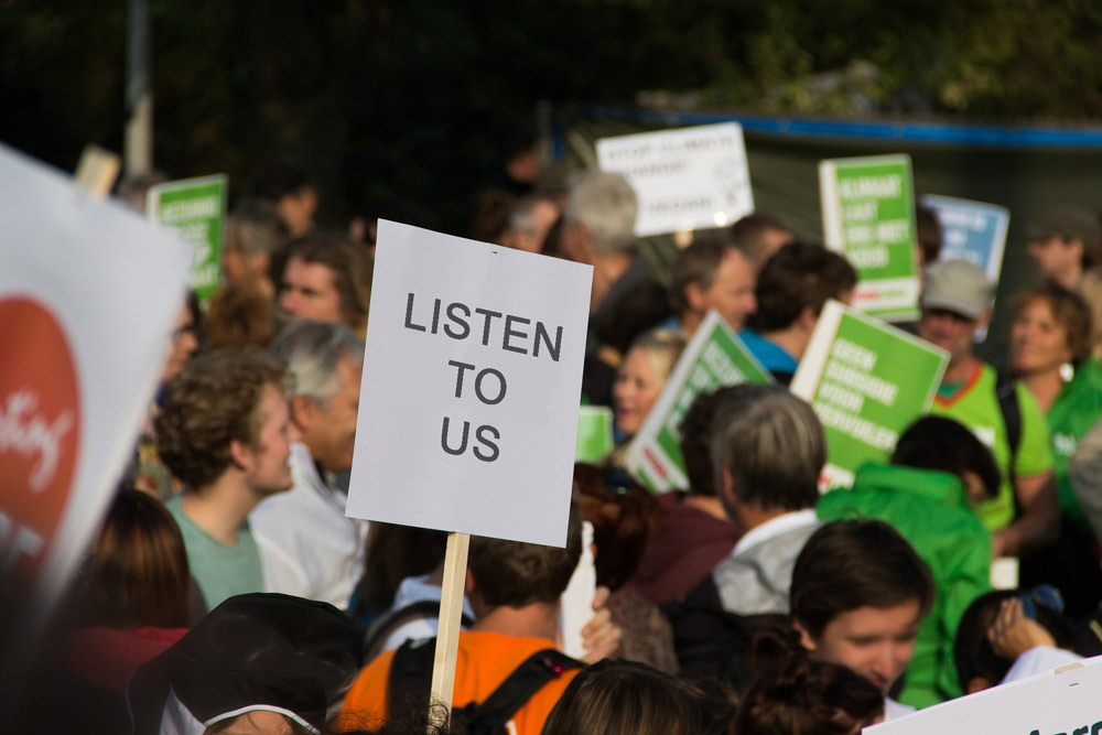 listen to us protest image